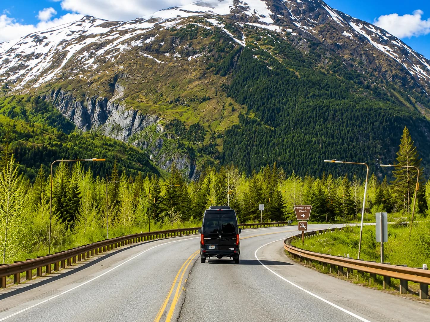 The Mercedes-Benz Sprinter Van on the highway to the cruise ports along Turnagain Arm between Anchorage, Seward and Whittier
